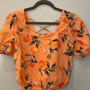 Orange fruit floral crop top